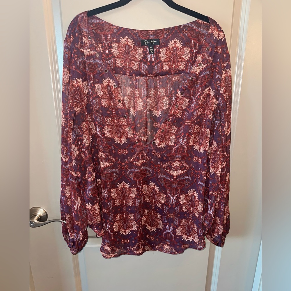 Sheer top. Missing ribbon